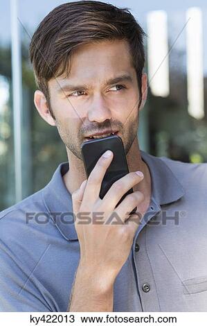 Man talking on a mobile phone View Large Photo Image Stock Image - Man talking on a mobile phone. Fotosearch