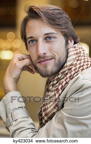 Picture - Close-up of a man smiling. Fotosearch