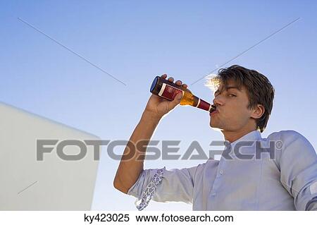 Man drinking beer View Large Photo Image Stock Photography - Man drinking beer. Fotosearch