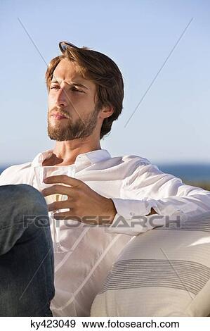 Stock Photo - Man drinking wine. Fotosearch