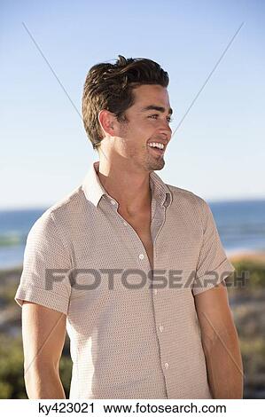 Stock Image - Man smiling. Fotosearch