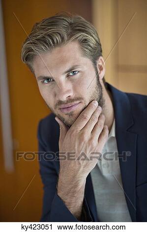 Portrait of a man posing View Large Photo Image Stock Image - Portrait of a man posing. Fotosearch