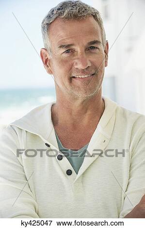 Stock Photo - Portrait of a man smiling. Fotosearch