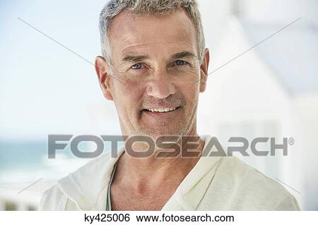 Portrait of a man smiling View Large Photo Image Stock Photograph - Portrait of a man smiling. Fotosearch