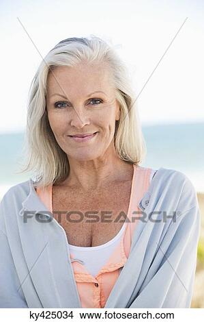 Portrait of a woman smiling View Large Photo Image Picture - Portrait of a woman smiling. Fotosearch