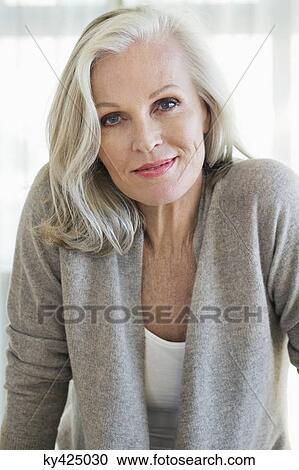 Portrait of a woman smiling View Large Photo Image Stock Image - Portrait of a woman smiling. Fotosearch