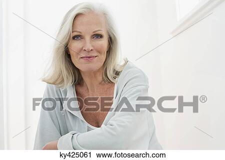 Portrait of a woman smiling View Large Photo Image Stock Image - Portrait of a woman smiling. Fotosearch