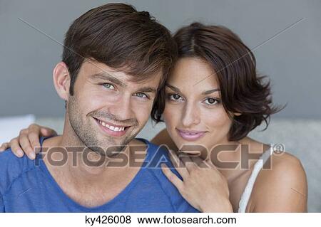 Stock Photo - Portrait of a couple smiling. Fotosearch