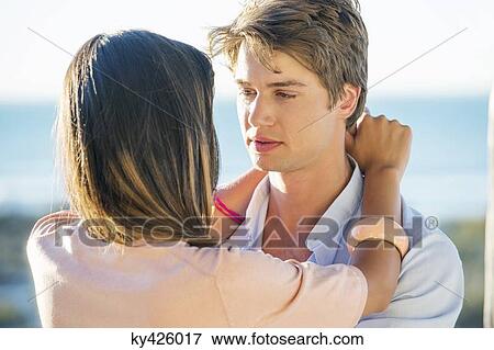Stock Photo - Romantic couple on the beach. Fotosearch