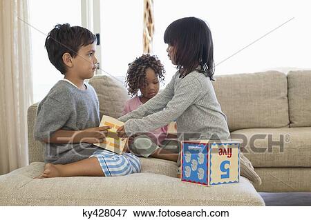 Children playing with number blocks View Large Photo Image Stock Photo - Children playing with number blocks. Fotosearch