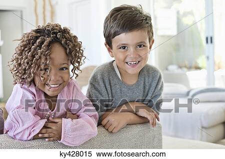 Portrait of a boy and girl smiling View Large Photo Image Stock Photography - Portrait of a boy and girl smiling. Fotosearch
