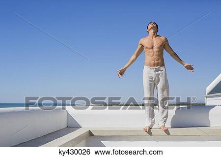 Man exercising View Large Photo Image Stock Photograph - Man exercising. Fotosearch