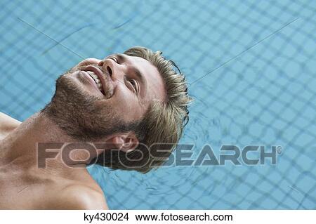 Picture - Man in a swimming pool. Fotosearch