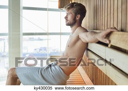 Stock Photography - Man relaxing in a sauna. Fotosearch