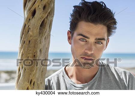 Portrait of a man looking serious View Large Photo Image Picture - Portrait of a man looking serious. Fotosearch