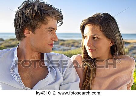 Stock Image - Couple looking at each other. Fotosearch
