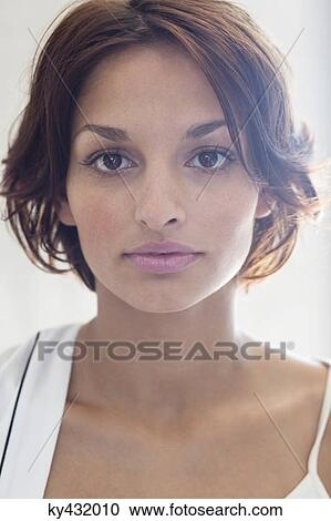 Stock Image - Close-up of a beautiful woman. Fotosearch