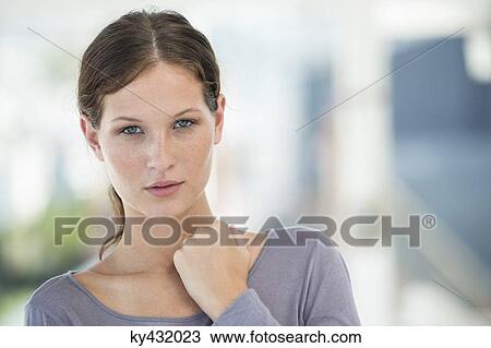 Stock Image - Portrait of a beautiful woman. Fotosearch