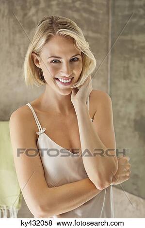 Stock Photo - Portrait of a woman smiling. Fotosearch