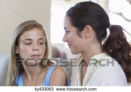 Woman discussing with her daughter View Large Photo Image Stock Image - Woman discussing with her daughter. Fotosearch