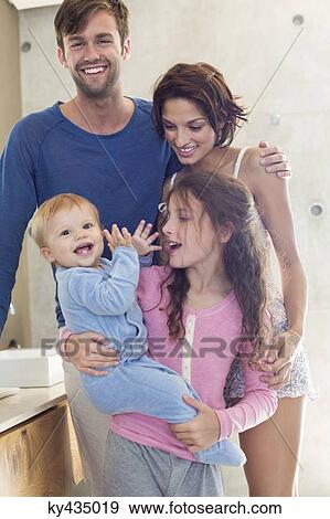 Happy family in a bathroom View Large Photo Image Stock Photo - Happy family in a bathroom. Fotosearch