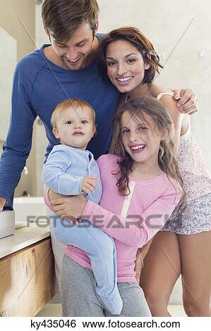 Happy family in a bathroom View Large Photo Image Stock Photograph - Happy family in a bathroom. Fotosearch