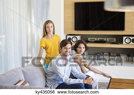 Portrait of a family smiling View Large Photo Image Stock Photograph - Portrait of a family smiling. Fotosearch