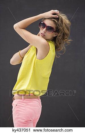 Portrait of a beautiful woman posing View Large Photo Image Stock Image - Portrait of a beautiful woman posing. Fotosearch