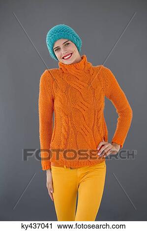 Portrait of a smiling woman posing View Large Photo Image Stock Image - Portrait of a smiling woman posing. Fotosearch
