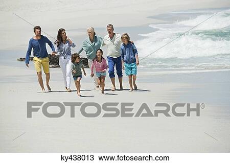 Family enjoying on the beach View Large Photo Image Stock Image - Family enjoying on the beach. Fotosearch