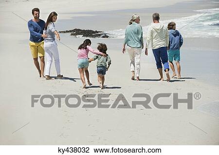 Family enjoying on the beach View Large Photo Image Stock Image - Family enjoying on the beach. Fotosearch