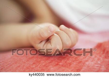 Stock Photography - Baby boy sleeping in the bed. Fotosearch