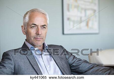 Close-up of a businessman thinking View Large Photo Image Stock Photography - Close-up of a businessman thinking. Fotosearch