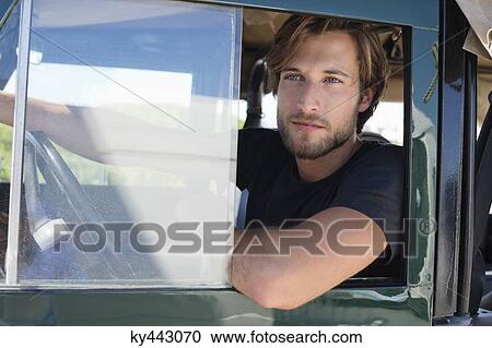 Man in SUV View Large Photo Image Stock Image - Man in SUV. Fotosearch