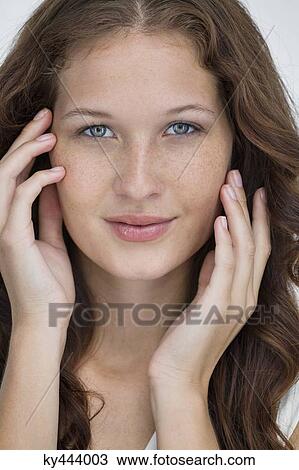 Stock Image - Portrait of a beautiful woman posing. Fotosearch