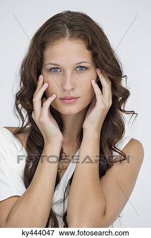 Portrait of a beautiful woman posing View Large Photo Image Stock Photo - Portrait of a beautiful woman posing. Fotosearch