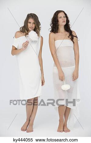 Portrait of two female friends posing View Large Photo Image Stock Photography - Portrait of two female friends posing. Fotosearch