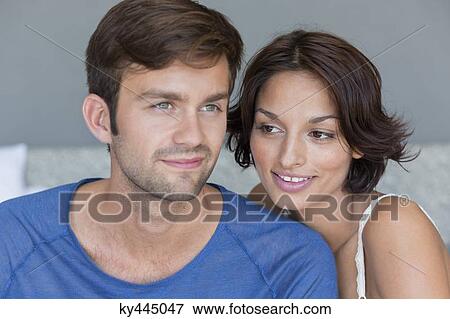 Stock Photo - Close-up of a couple smiling. Fotosearch