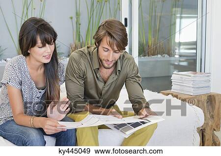 Couple matching blueprint with color swatch View Large Photo Image Stock Photo - Couple matching blueprint with color swatch. Fotosearch