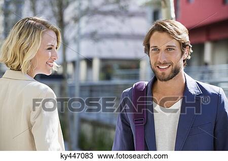 Close-up of a man and woman smiling View Large Photo Image Stock Image - Close-up of a man and woman smiling. Fotosearch