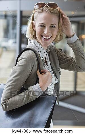 Portrait of a beautiful woman smiling View Large Photo Image Stock Photography - Portrait of a beautiful woman smiling. Fotosearch