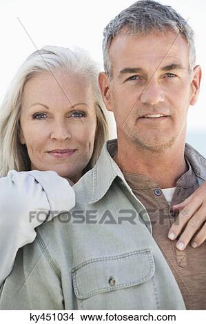 Portrait of a couple smiling View Large Photo Image Picture - Portrait of a couple smiling. Fotosearch