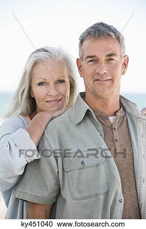Stock Image - Portrait of a couple smiling. Fotosearch