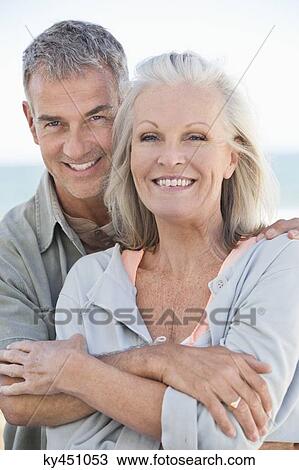 Stock Image - Portrait of a couple smiling. Fotosearch
