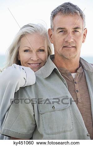 Portrait of a couple smiling View Large Photo Image Stock Image - Portrait of a couple smiling. Fotosearch