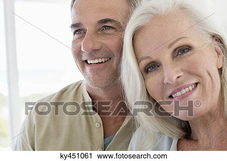 Stock Image - Smiling senior couple. Fotosearch