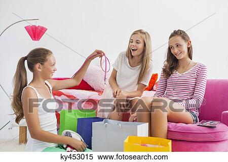 Girls enjoying good time at a slumber party View Large Photo Image Stock Photography - Girls enjoying good time at a slumber party. Fotosearch