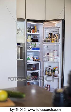 Assorted food in a refrigerator View Large Photo Image Stock Image - Assorted food in a refrigerator. Fotosearch