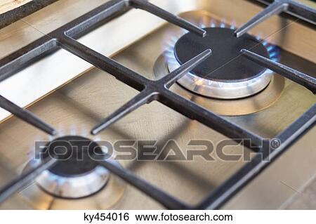 Close-up of a gas stove burner View Large Photo Image Stock Photograph - Close-up of a gas stove burner. Fotosearch