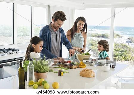 Family preparing food View Large Photo Image Stock Image - Family preparing food. Fotosearch